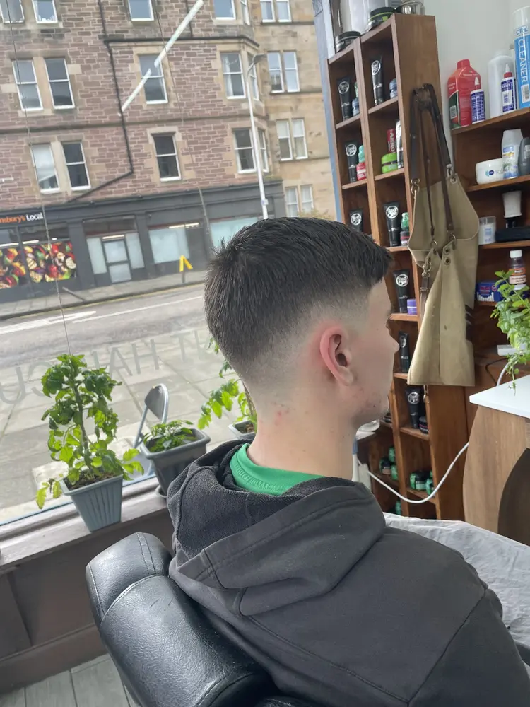 Mid skin fade with textured crop