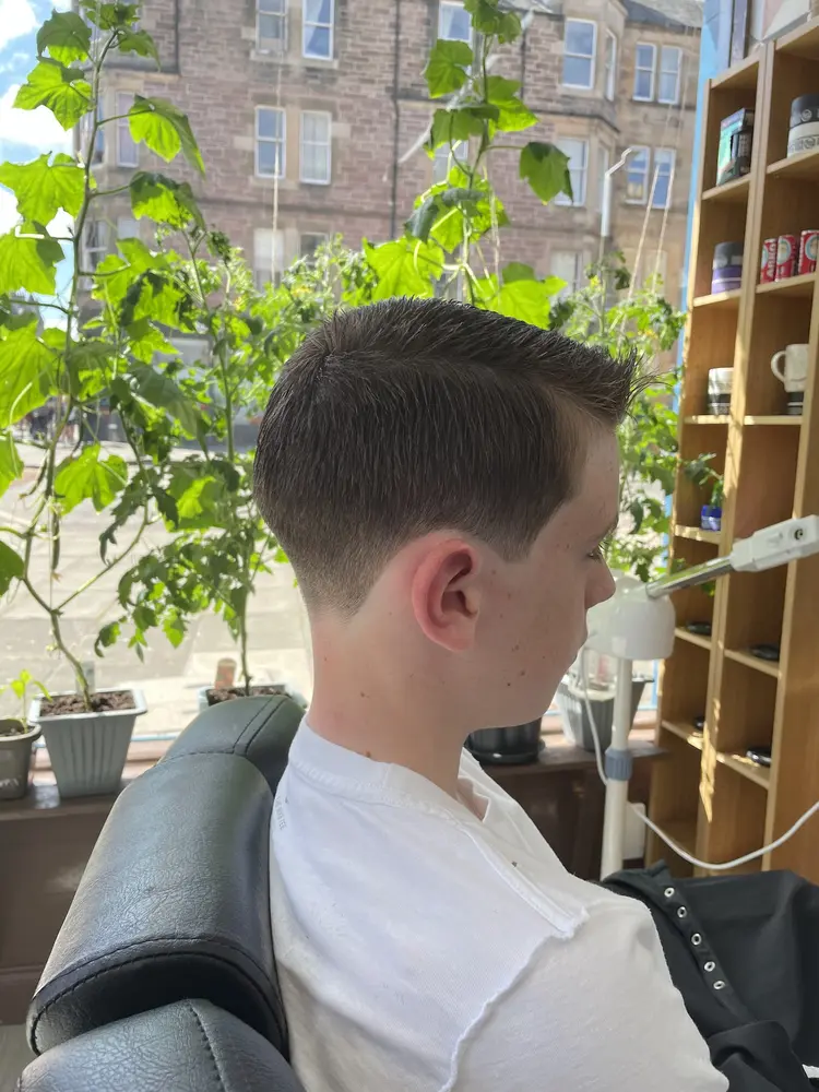 Low taper fade, tidy neckline